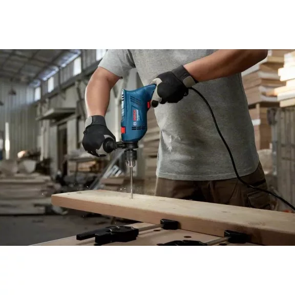 BOSCH 06011A0321 GSB 600 Ütvefúrógép (100 részes tartozékszettel)